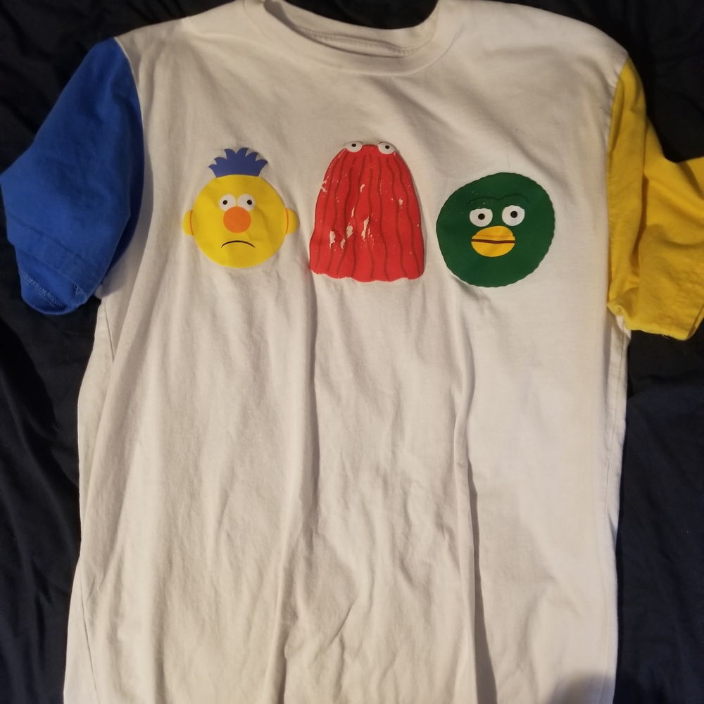Hot Topic White Tee with Blue, Yellow, Red, and Green Accents
